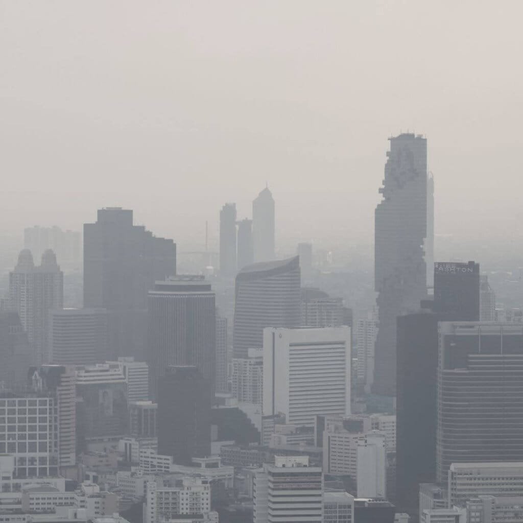 skyline of bangkok choked by air pollution