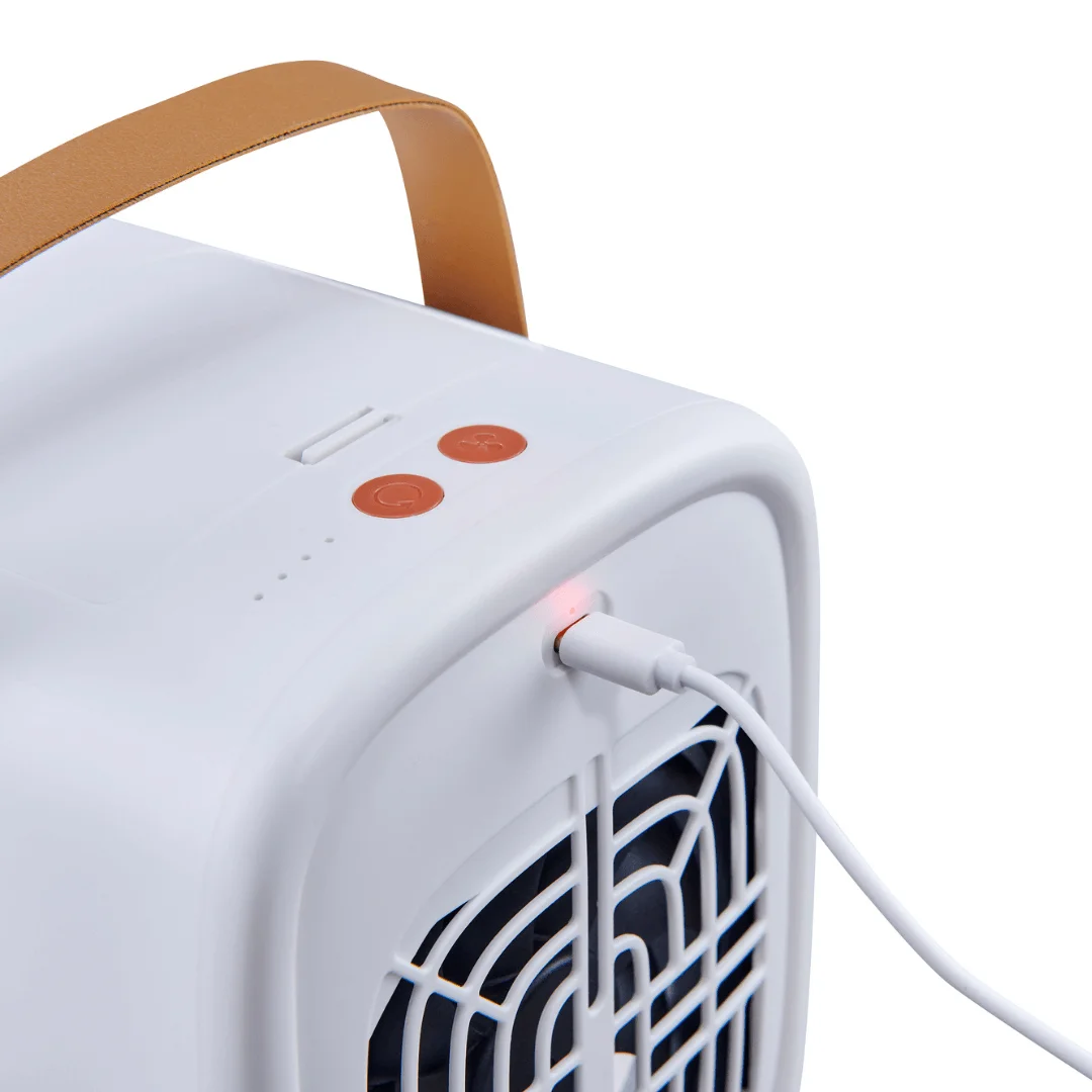 close up of the qt3 portable air purifier with usb c cable in the back