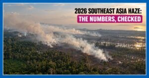 Aerial view of smoke drifting from peatland fires across Indonesian forest towards the sea